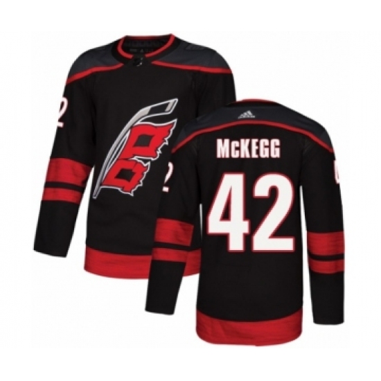 Men's Adidas Carolina Hurricanes 42 Greg McKegg Premier Black Alternate NHL Jersey