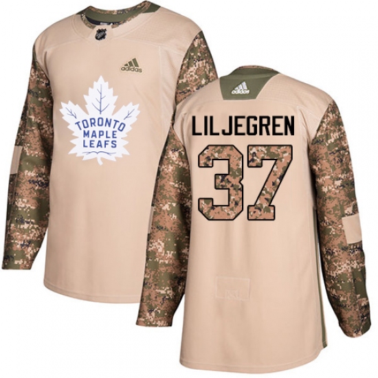 Men's Adidas Toronto Maple Leafs 37 Timothy Liljegren Authentic Camo Veterans Day Practice NHL Jersey